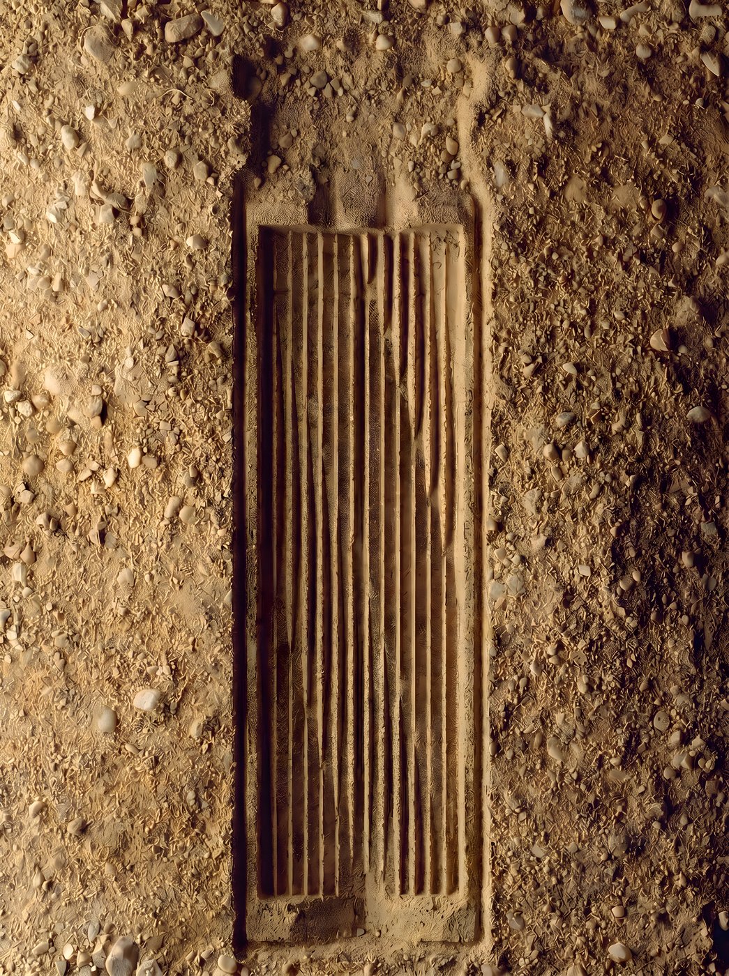 Wooden cask grate set into the earth